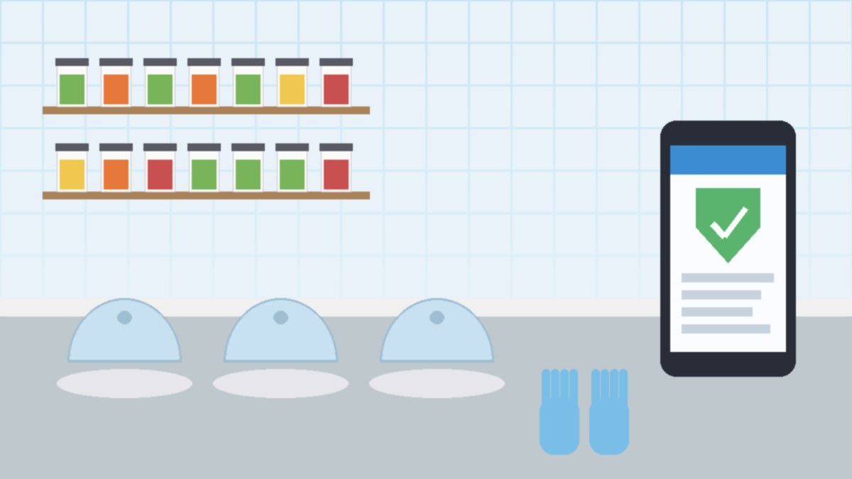 Illustration of a clean food stall kitchen counter with covered dishes, gloves and a smartphone showing an online lesson with a shield checkmark